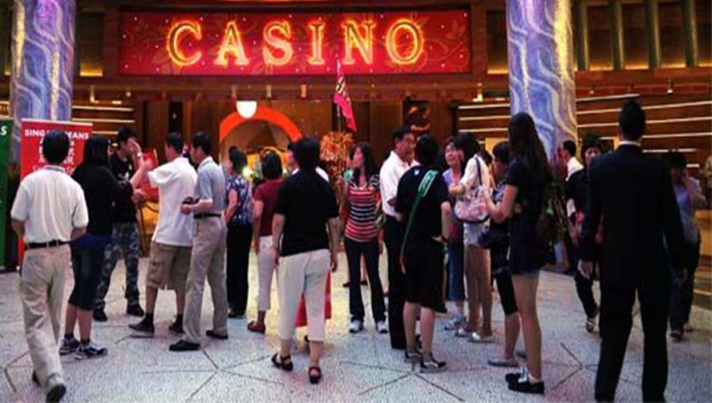 Can someone with a work permit enter a casino singapore